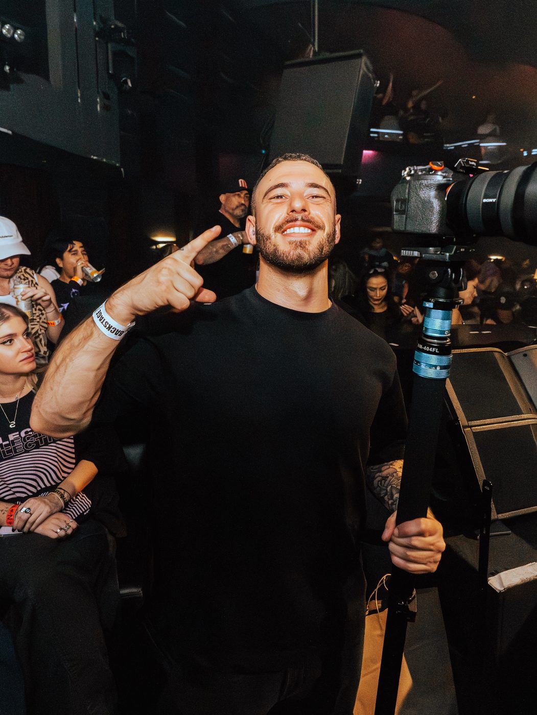 Jeremy Rich backstage with his camera
